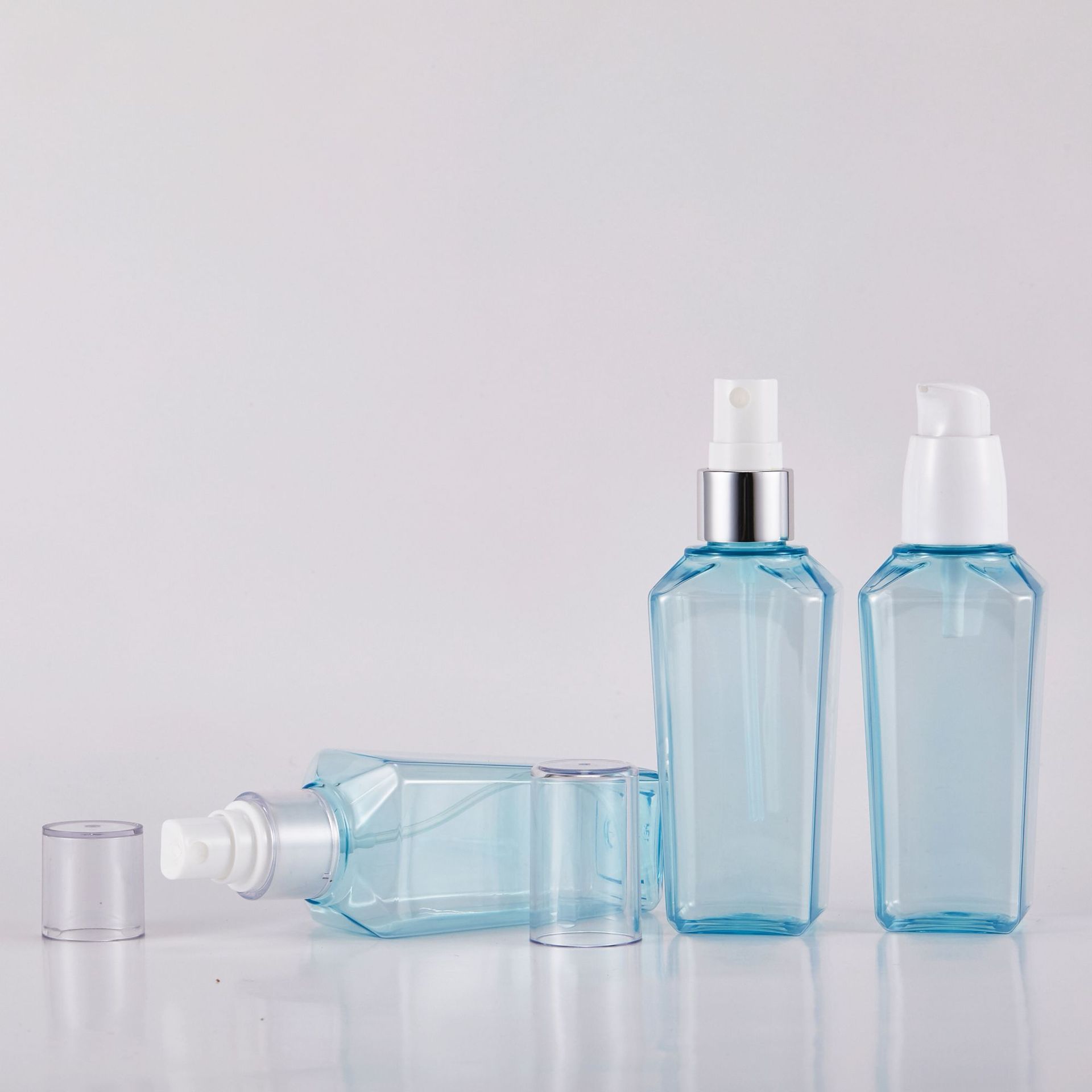 100ml Square PET bottle with 24-410 treatment pump.jpg