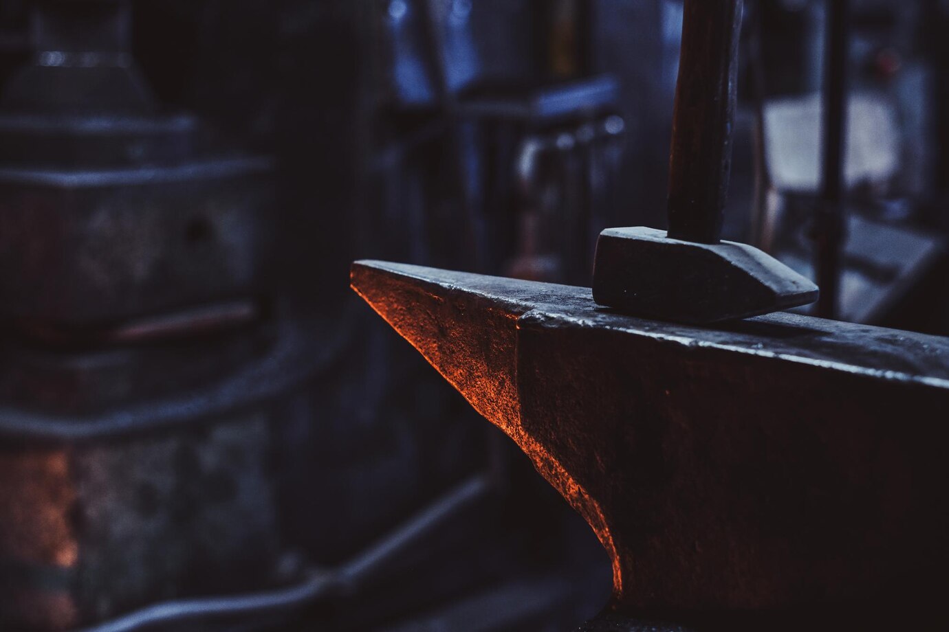 close-up-photo-shoot-hammer-anvil-dark-smith-workshop_613910-17449.jpg