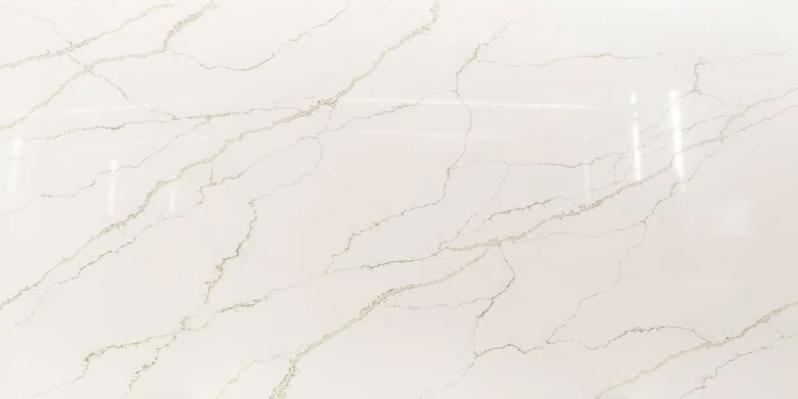 Calacatta-Ariston-Gold-Quartz-Slab-with-Super-White-Base.jpg