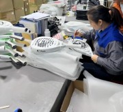 9 QC inspection of padel rackets-deburring holes with file.jpg 